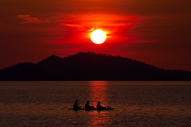 Illuminated Night Kayaking at the Elysian Resort - Returning to shore for fruit and rum punch