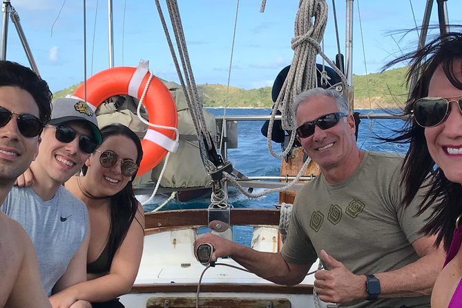 Learn to Sail - Sailing Lessons All Inclusive - Taking the helm off St. John